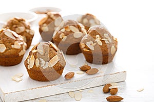 Muffins with flaked almond nuts. Cupcakes with nut chips