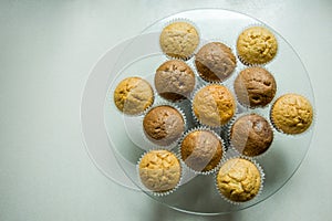 Muffins on a glass plate, top view
