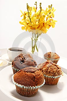 Muffins and orchids photo