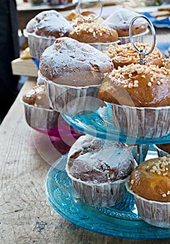 Muffins in a vintage tier cake stand.