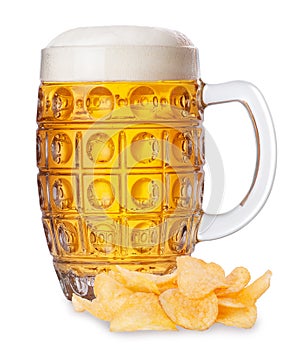 Mug of beer with foam and pile of potato chips isolate