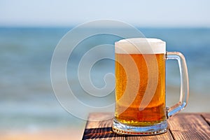 Mug of beer with froth and bubbles