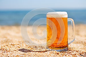 Mug of beer with froth and bubbles