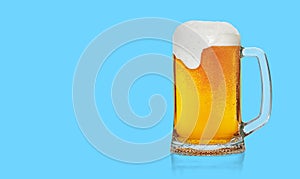 Mug of beer with froth foam