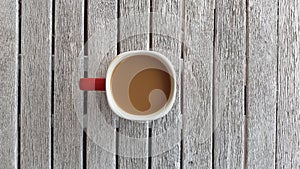 Mug of coffee on old whie vintage wooden table