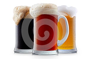 Mug collection of frosty beer with foam