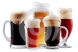 Mug collection of frosty beer with foam