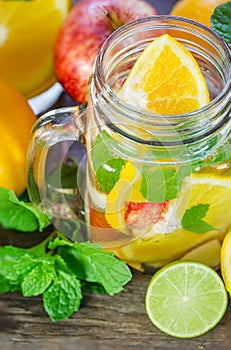 Mug delicious refreshing drink of mix fruits with mint