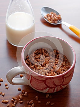 Mug filled chocolate cereals breakfast closeup