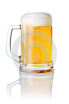 Mug fresh beer with cap of foam isolated on white