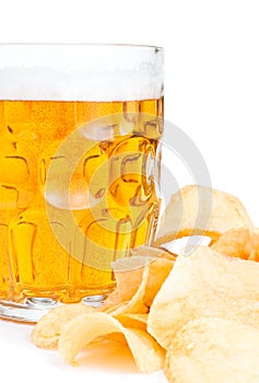 Mug of Fresh beer and Pile of potato chips