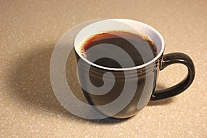 Mug with freshly brewed coffee