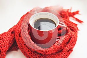 Mug with hot coffee.