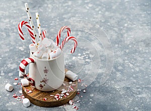 Mug with marshmellows and candy canes