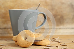 Mug of milk with cookies and bran sticks