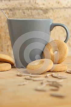 Mug of milk with cookies and bran sticks