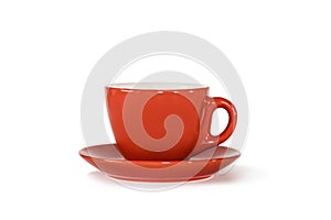 Mug with orange saucer on white isolate background