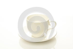 Mug and saucer on a white background