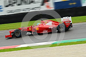 MUGELLO, ITALY 2012: Fernando Alonso of Ferrari F1 team racing at Formula One Teams Test Days at Mugello Circuit in Italy