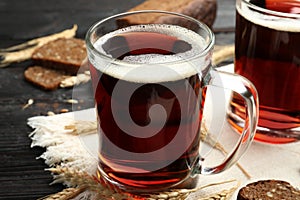Mugs of delicious kvass, spikes and bread