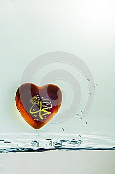 `muhammad ` prophet of Islam symbol Water splash with bubbles of air, on the white background