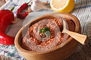 Muhammara - appetizer of peppers and nuts close-up. Horizontal