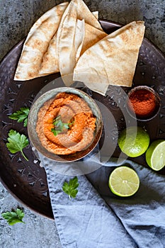 Muhammara, healthy walnut and roasted red bell pepper dip served with flatbread