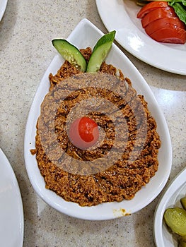 Muhammara or mhammara is a spicy dip made of walnuts, red bell peppers, pomegranate molasses, and breadcrumbs.