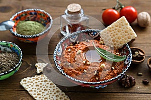 Muhammara traditional Arabian appetizer on the table close-up. vertical