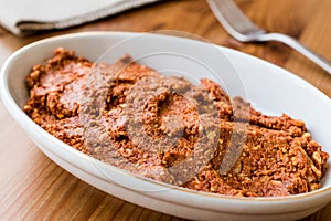 Muhammere, acuka or acika made with tomato paste.