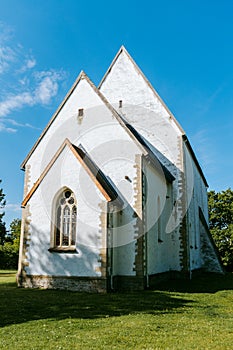 Muhu St. Catherine`s church on Muhu Island near Saaremaa in Estonia during sunny day. Gothic style church