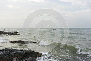 Mui Ne beach, Vietnam, a beautiful beach with long coastline, silver sand and huge waves, in an early morning