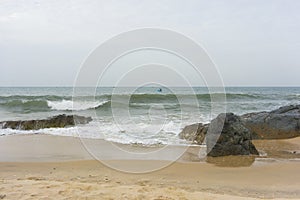 Mui Ne beach, Vietnam, a beautiful beach with long coastline, silver sand and huge waves, in an early morning