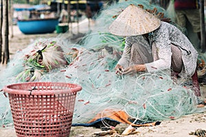 Mui ne fishemans village. Traditional Vietnamese boat in the basket shaped in Fishing village  Mui Ne, Vietnam