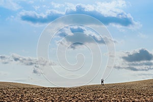 MUI NE, VIETNAM - APRIL 25 : Unidentified tourists relax and take photos on April 25,2019 at Red Sand Dunes desert in Mui Ne,