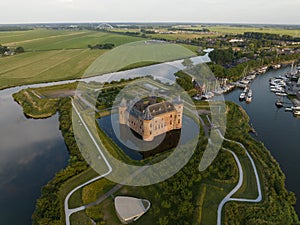 Muiderslot medieval stronghold castle restored heritage culture monument for touristic museum purpose. Aerial overhead