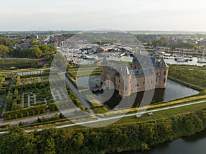 Muiderslot medieval stronghold castle restored heritage culture monument for touristic museum purpose. Aerial overhead