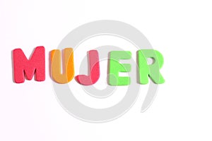 Mujer, woman word lettering in Spanish photo