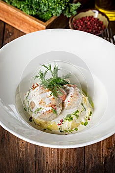 Muksun cutlets served in a white plate