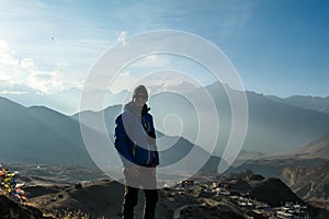 Muktinath - A man enjoying the Himalayan landscape