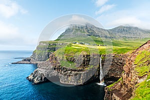 Mulafossur waterfall in Gasadalur, Vagar Island of the Faroe Islands photo