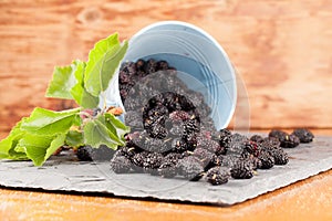 Mulberries split on a slate board