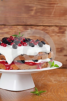 Mulberry and red currant cake with whipped cream