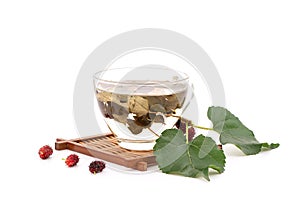 Mulberry and tea isolated on white background