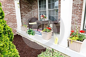 Mulching flowerbeds around the house