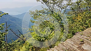 Mule trail at Cima Sasso in wild Val Grande, view of Lake Maggiore. National park in Piedmont, Italy.