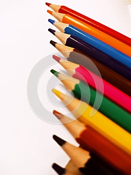 Muliple colored pencils in row