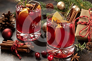 Mulled red wine with Christmas decorations in background