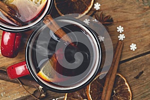 Mulled wine background. A hot winter Christmas drink based on red wine, spices and citrus fruits