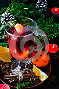 Mulled wine for Christmas Eve celebration party by Christmas tree.